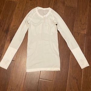 White lululemon long sleeve shirt. In perfect condition!